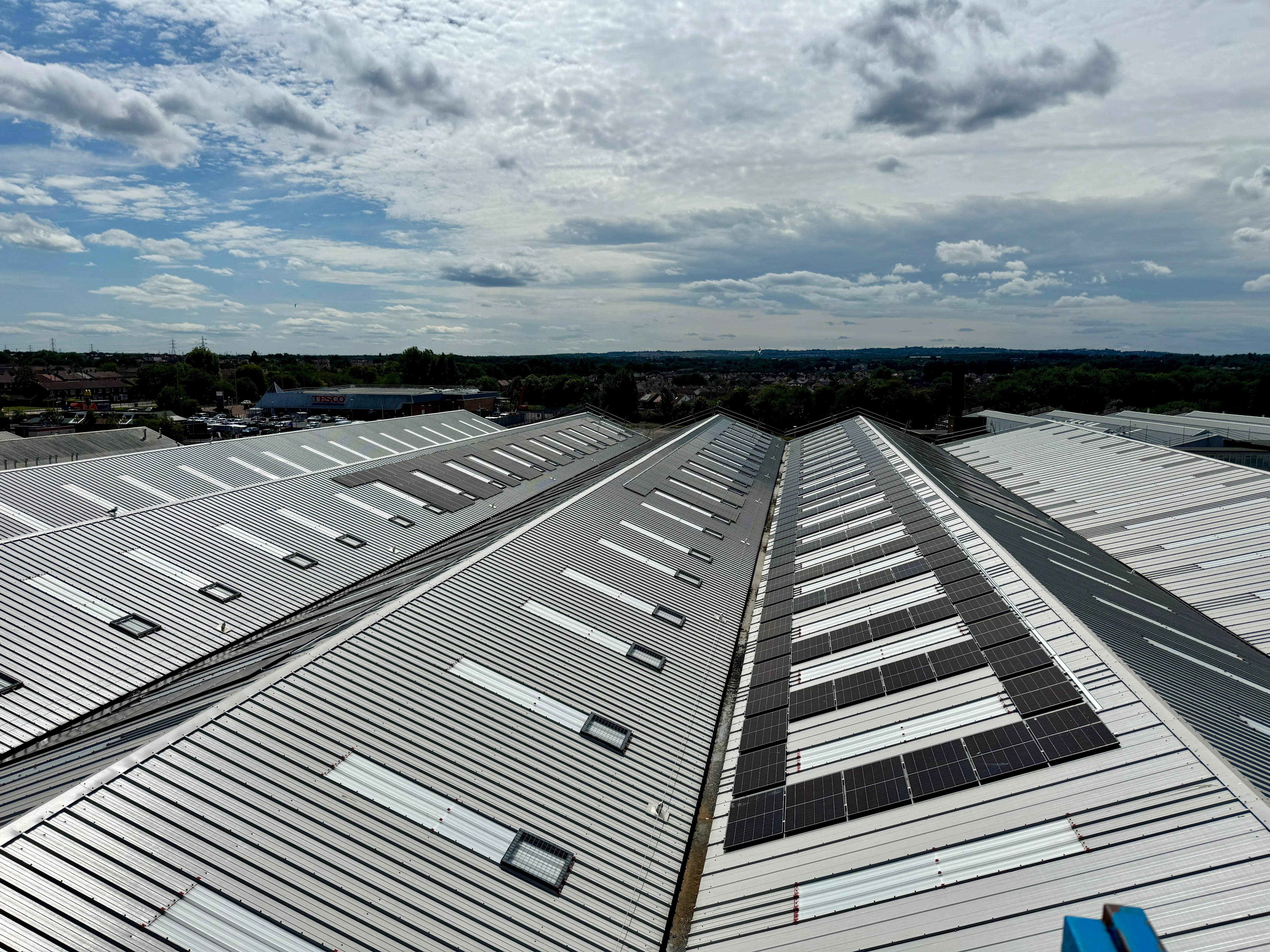 Financed commercial solar installation across a large factory roof