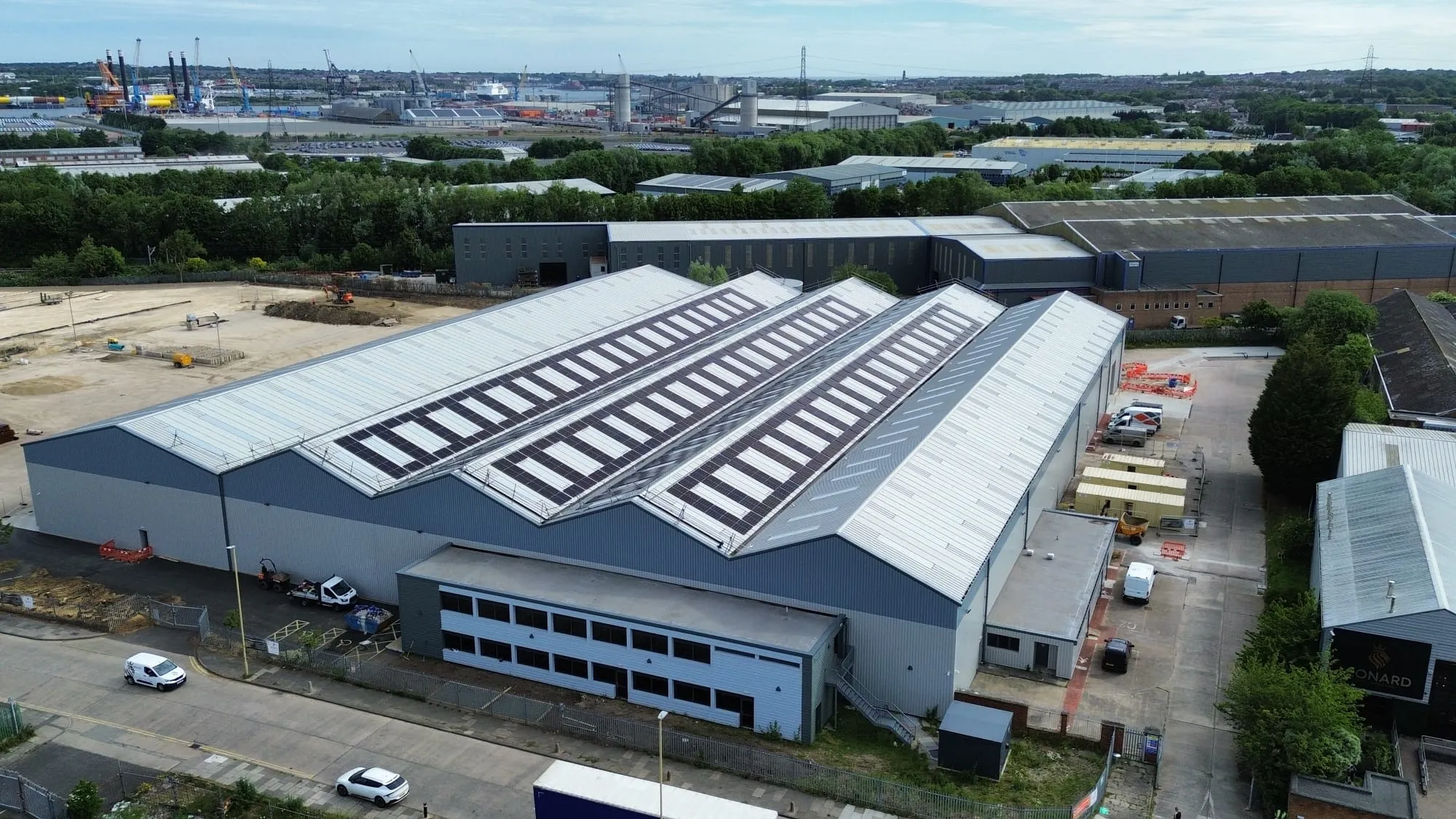 Trapezoidal warehouse roof in South Shields covered with solar panels