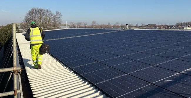 Panels being installed across the joinery and construction factory roof