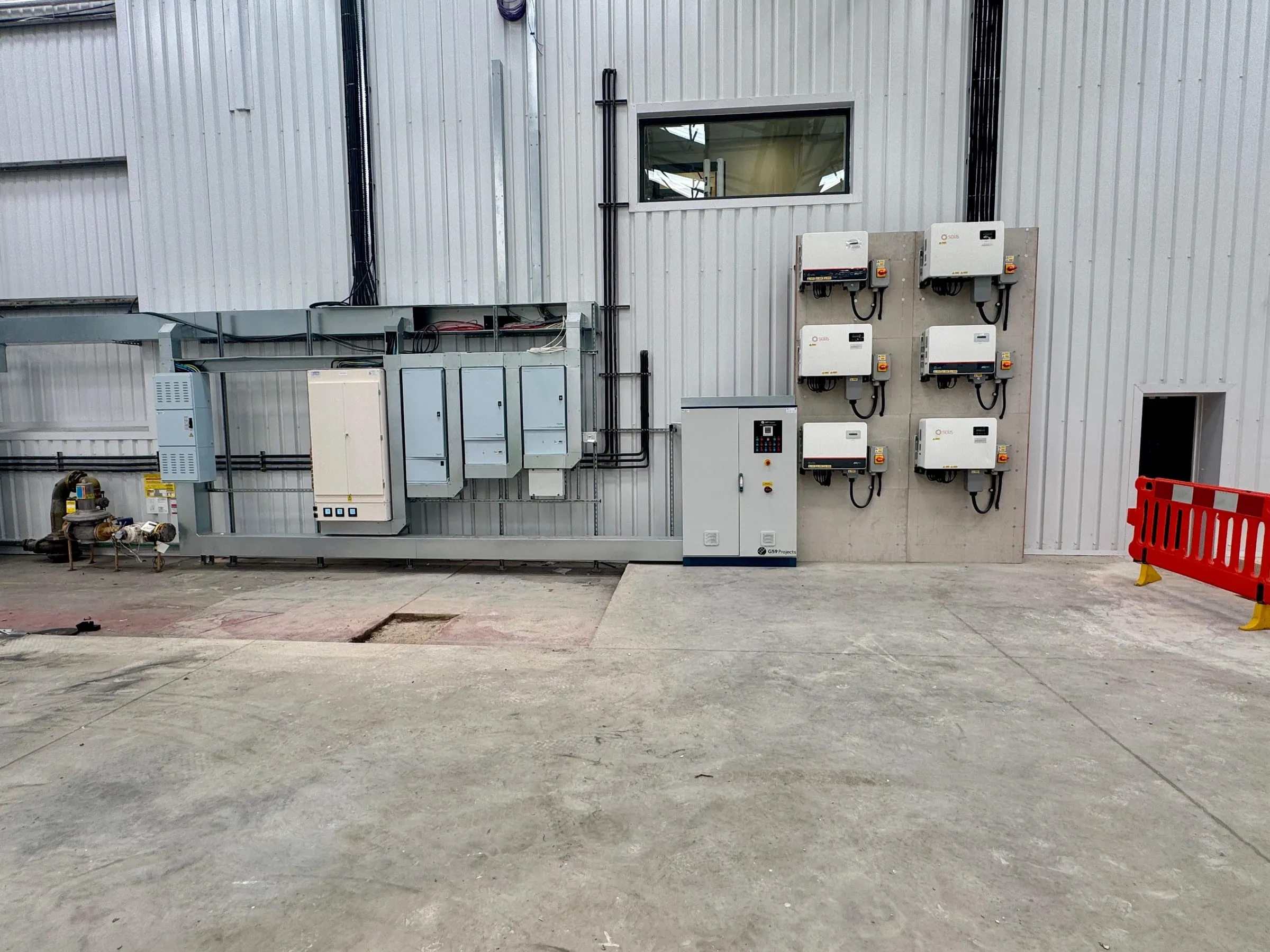 Six high-performance inverters and the G99 control board installed at the DHL site