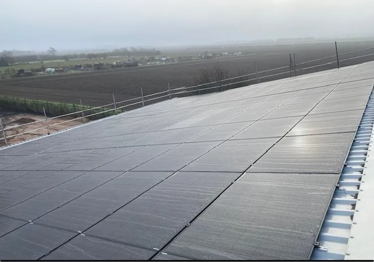 Solar array across the roof of Woodyfuel's biomass production facility at Winterton